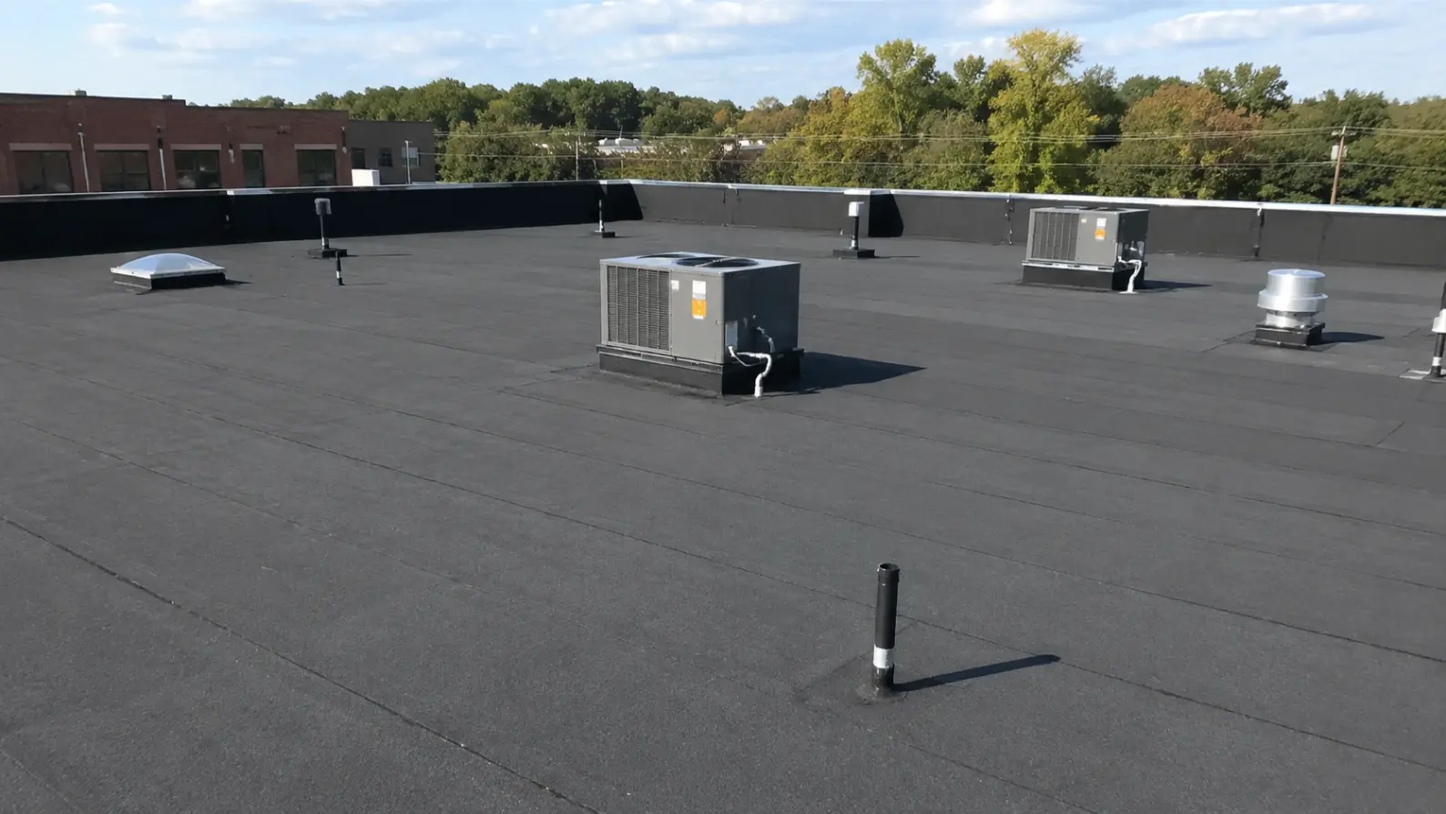 Flat TPO roofing low slope residential DFW Texas