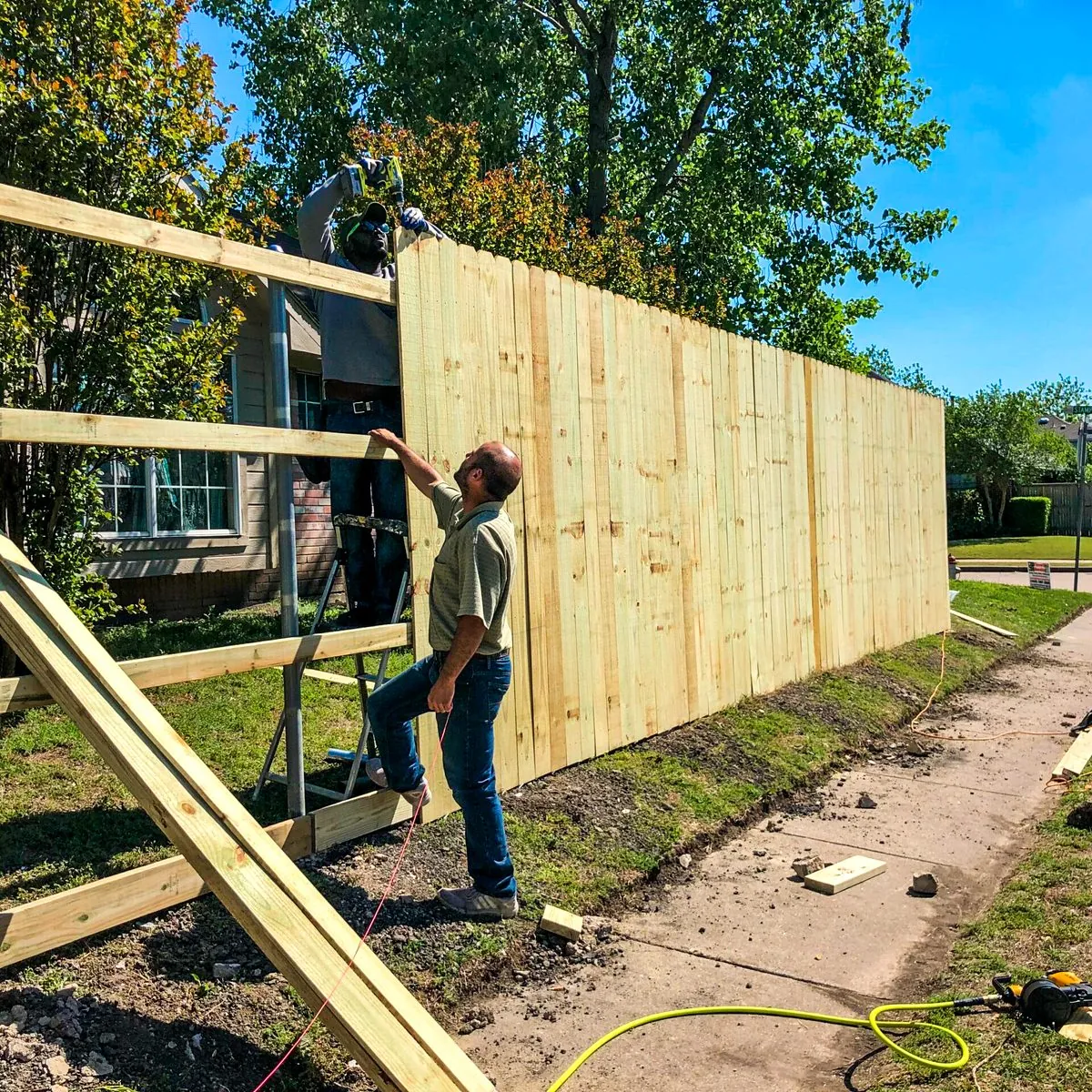 Firewheel crew installing a new cedar fence in DFW