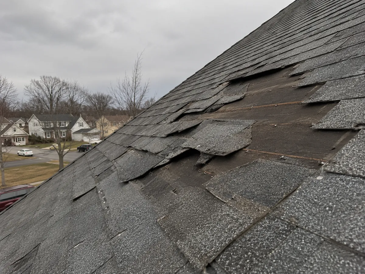 Missing or Curling Shingles — sign you need roof repair in DFW