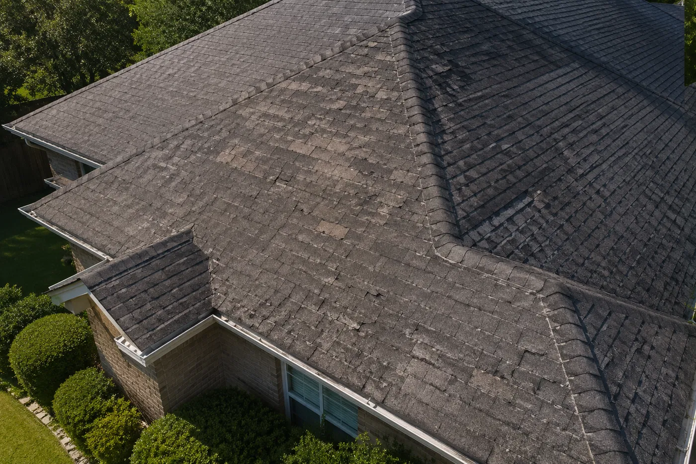 Widespread Shingle Damage — sign you need roof replacement